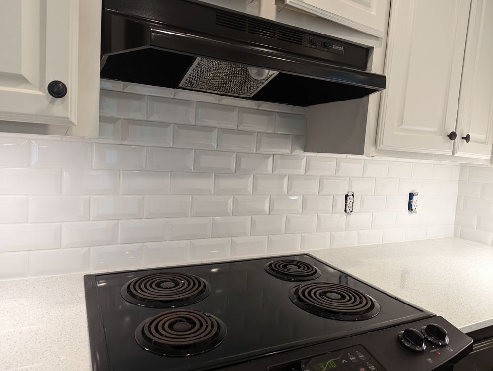Beveled subway tile backsplash