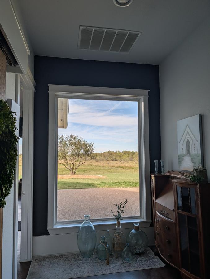 Navy accent wall framing the view