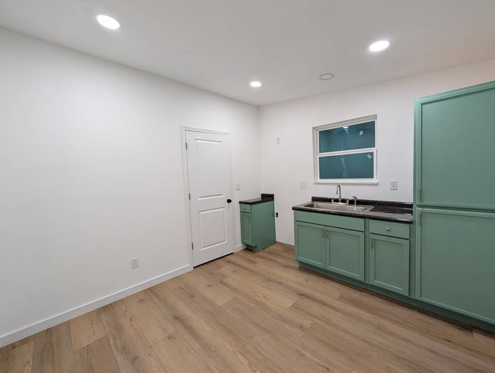 Kitchenette, new floors, doors and windows