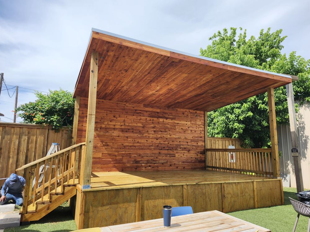 Finished covered wood stage